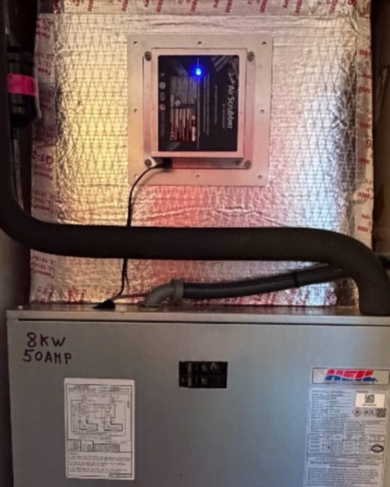 Germicidal Air Scrubber purifier installed above an indoor air handler